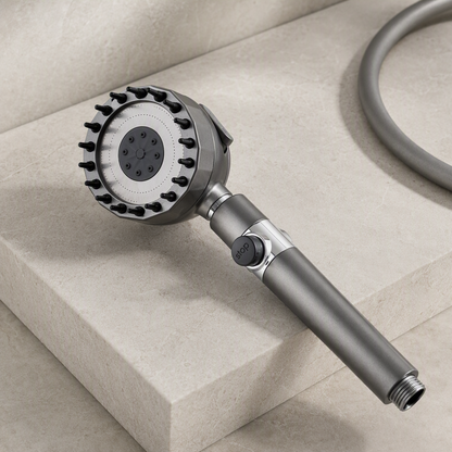 Pommeau de douche massant trois modes Gris